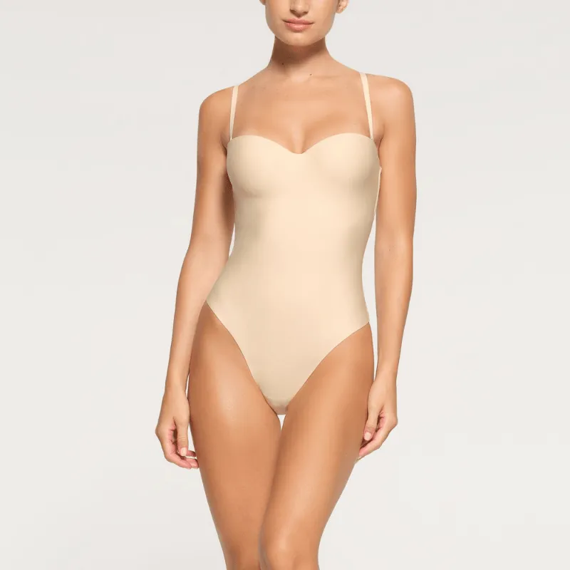 Adjustable Strap Contouring Bodysuit – Sleek Fit and Seamless Design
