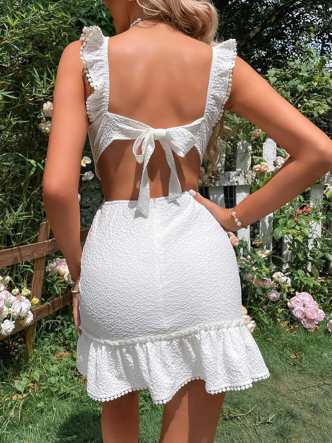 WDIRARA Women's Boho Backless Knot Ruffle Hem High Waist Trim Textured Mini Dress