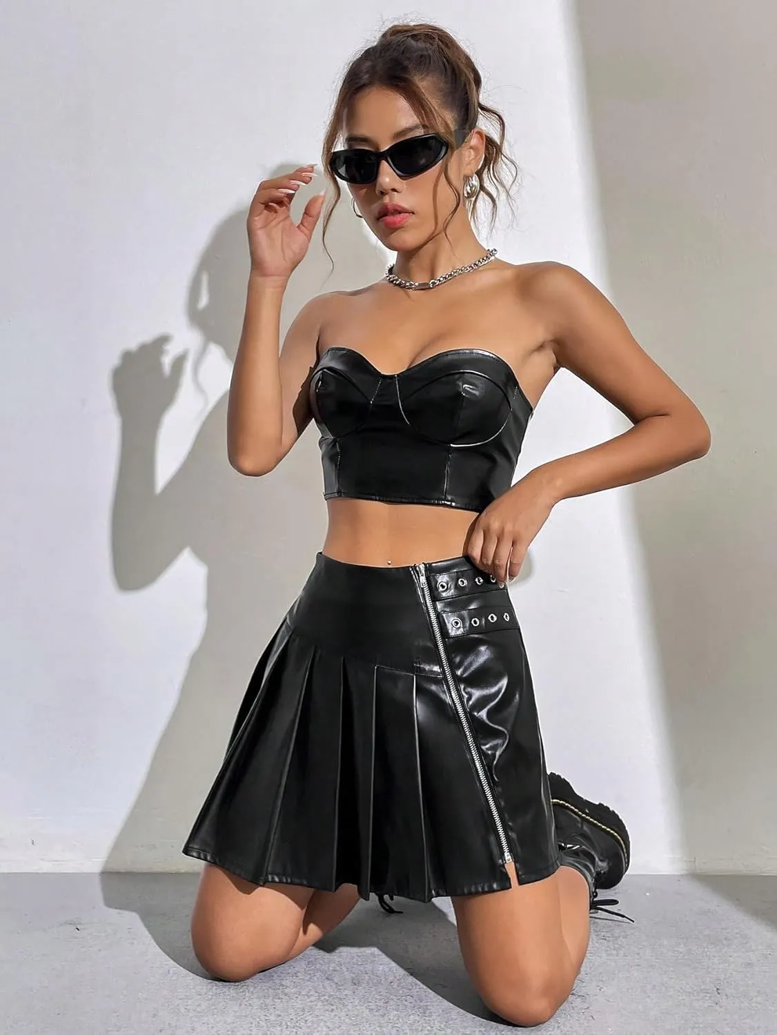 WDIRARA Women's Zip Up PU Leather Pleated Skirt Eyelet High Waist A Line Mini Skirts